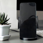 A smartphone securely mounted in the PHOBIA Car Vent Mobile Holder inside a car.