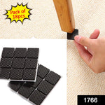 Close-up of a square self-adhesive furniture pad applied to a chair leg.