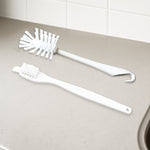 Two-piece multifunctional cleaning brush set for household use