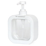 New clear plastic soap dispenser in its retail packaging.