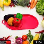 Ergonomic plastic cutting board with a sliding collection tray.