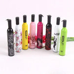 Side view of the DrizzlePro Wine Bottle Umbrella, partially open.