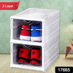Front view of the white two-layer stackable storage rack with smooth-gliding wheels.