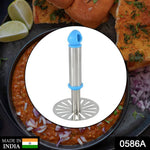 Durable stainless steel masher preparing smooth mashed potatoes.