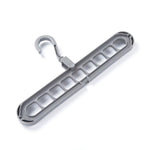 The durable plastic hanger demonstrating its 360-degree rotating hook for versatile use.