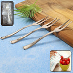 Mini dessert and fruit forks arranged neatly for a fruit platter