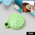 Ergonomic scalp massage comb held in hand, highlighting its comfortable grip and portable size.
