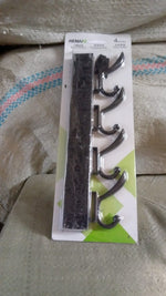 Eco-friendly adhesive and mounting accessories for the GlimmerHome coat hanger.