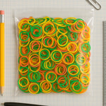 A vibrant pile of assorted elastic rubber bands ready for various tasks.