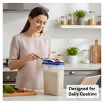Stackable modular airtight food storage containers neatly organized in a modern kitchen pantry.