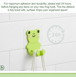 Detailed view of plug being hung on socket holder