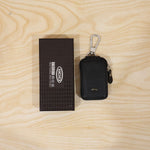 Car key holder in retail packaging display.