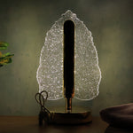 Decorative LED table lamp casting unique reflections with USB power feature