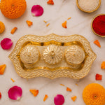 Top view showing the three-bowl design of the Kankavati.