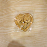Packaged heart-shaped kumkum holder for gifting