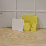 Product packaging highlighting key features of the wall mount holder.