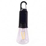 Portable solar camping lamp on white background
