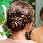 Women hairstyle using side hair comb during styling