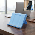 Phone stand on a desk during video calls.