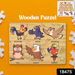 Child's hands playing with the vibrant Wooden Bird Puzzle, developing fine motor skills.