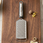 Steel grater ideal for vegetables, lemon zest, and spices