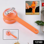 Close-up of stainless steel blade and ergonomic handle of peeler