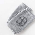 Toddler Knee Guard in wool knit, shown on a child's leg for protection.