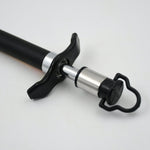 Close-up of the stainless steel gas lighter producing a reliable spark for ignition.