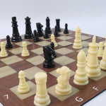 Family enjoying playing Chess & Checkers travel board game