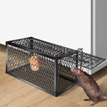 Foldable humane mouse trap cage with door open, ready for bait.