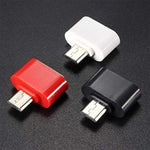 Close-up of the compact PHOBIA USB OTG adapter, ready for various connections.