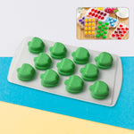 Flexible silicone fruit shape ice cube tray with multiple cavities.