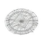 The durable stainless steel chef basket straining boiled vegetables for a healthy meal.