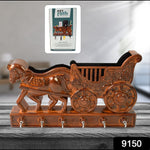 Close-up view of the intricate Rath design on the plastic key rack, showing traditional details.