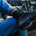 Side view of men's ankle socks illustrating elastic grip and arch compression