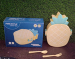 Colorful retail packaging box for the pineapple kids bento lunch box, showcasing its features.