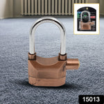 Close-up of the metallic anti-theft padlock shackle and keyhole.