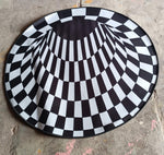 Full view of 3D space round carpet showcasing checkered pattern