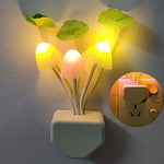 A pair of colorful mushroom night lights providing gentle illumination in a home setting.