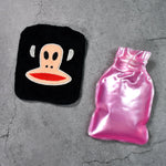 A person using the mini hot water bag on their neck for soothing pain relief.