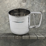 Flour sifter in action, demonstrating how it easily sifts ingredients for baking.