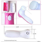 Hand holding the compact 5-in-1 skin cleansing brush, demonstrating its portability.