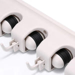 Detailed view of the durable construction of the GlimmerHome mop and broom holder.