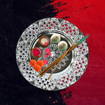 Festive plastic Pooja Thali set arranged for Indian celebrations.