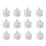 An array of decorative acrylic candles illuminating a festive display.