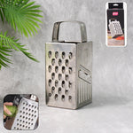 Stainless steel 4-in-1 compact grater and slicer front view showing versatile blades