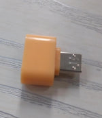 Detailed view of the Micro USB OTG adapter's connectors for reliable Android device pairing.