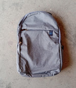FERVENT laptop bag packed with daily essentials, demonstrating its ample storage capacity.