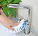 Ergonomic flexible cleaning brush angled to show effective reach for bathroom fixtures.