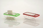 Quickslice multi-functional cheese grater with a detachable container for easy kitchen use.